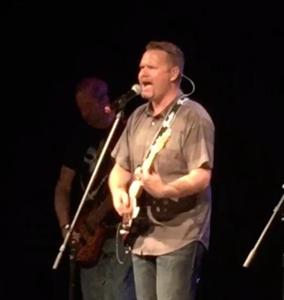 The artist performing live